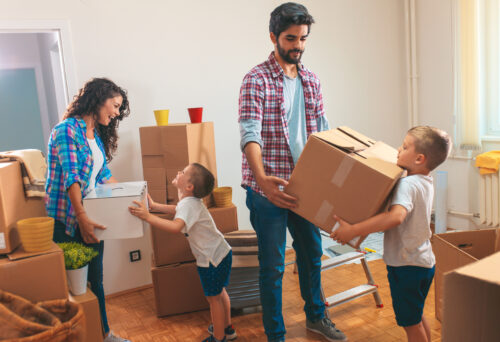 family with moving boxes